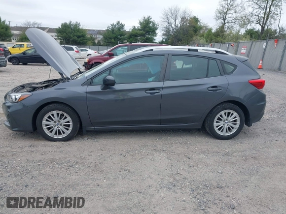 2018 Subaru Impreza Premium z VIN 4S3GTAD61J3703780, wystawiony jako IAAI lot #42081604 z przebiegiem 79 757 mil mil oraz . Historia ofert i sprzedaży dostępna na DreamBid. Obrazek 14.
