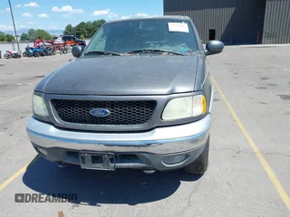 2003 Ford F-150 XLT with VIN 1FTRW08L63KD17116, listed as a IAAI auction lot 42811062 with Not provided miles and . Bid and sale history available at DreamBid. Image 12.