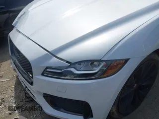 2019 Jaguar F-Pace S with VIN SADCM2FV9KA609878, listed as a IAAI auction lot 42098671 with 90,112 mi miles and . Bid and sale history available at DreamBid. Image 6.