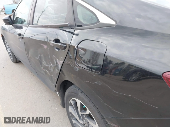 2018 Honda Civic EX with VIN 2HGFC2F75JH583892, listed as a IAAI auction lot 41697605 with 134,675 mi miles and . Bid and sale history available at DreamBid. Image 18.