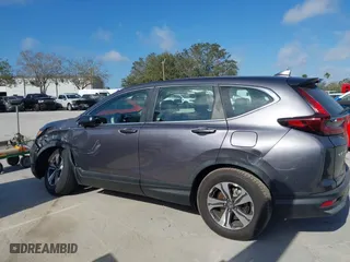 2020 Honda CR-V LX with VIN 7FARW1H29LE009775, listed as a IAAI auction lot 41571693 with 60,794 mi miles. Bid and sale history available at carsss.com. Image 14.