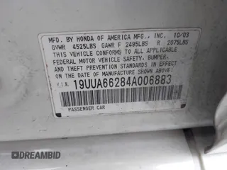 2004 Acura TL z VIN 19UUA66284A006883, wystawiony jako IAAI lot #40707104 z przebiegiem 198 450 mil mil oraz . Historia ofert i sprzedaży dostępna na DreamBid. Obrazek 9.