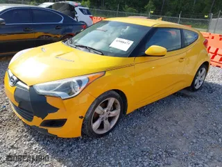 2012 Hyundai Veloster w/Gray Int with VIN KMHTC6AD2CU079902, listed as a IAAI auction lot 42088473 with 143,983 mi miles. Bid and sale history available at carsss.com. Image 2.