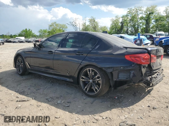 2020 BMW 5 Series M550i xDrive with VIN WBAJS7C03LCD00279, listed as a Copart auction lot 55698035 with 76,057 mi miles and Clean title. Bid and sale history available at DreamBid. Image 2.