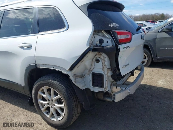 2015 Jeep Cherokee Latitude with VIN 1C4PJMCS1FW795579, listed as a IAAI auction lot 41661163 with 108,246 mi miles. Bid and sale history available at carsss.com. Image 6.