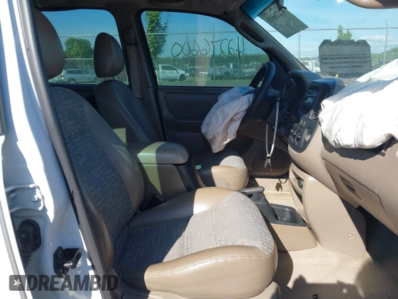 2002 Ford Escape XLS Choice with VIN 1FMYU01102KC48220, listed as a IAAI auction lot 42276600 with 195,358 mi miles and . Bid and sale history available at DreamBid. Image 5.
