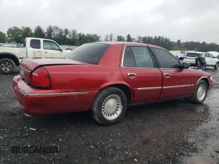 1999 Mercury Grand Marquis LS с VIN 2MEFM75W9XX701991, выставлен на аукционе Copart как лот 58388085 с пробегом 163 160 миль миль и Списание • Salvage title. История ставок и продаж доступна на DreamBid. Изображение 3.