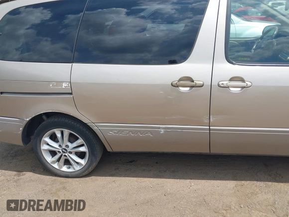 2001 Toyota Sienna LE with VIN 4T3ZF13C01U325889, listed as a IAAI auction lot 42795570 with 211,585 mi miles and . Bid and sale history available at DreamBid. Image 6.