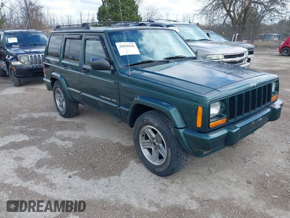 2000 Jeep Cherokee Classic with VIN 1J4FF58S3YL258755, listed as a IAAI auction lot 42020260 with 228,867 mi miles. Bid and sale history available at carsss.com. Image 1.