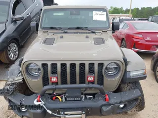 2020 Jeep Gladiator Rubicon z VIN 1C6JJTBG6LL179541, wystawiony jako IAAI lot #42050510 z przebiegiem 52 784 mil mil oraz . Historia ofert i sprzedaży dostępna na DreamBid. Obrazek 11.