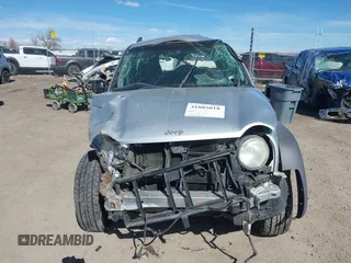 2004 Jeep Liberty Sport with VIN 1J4GL48K84W145318, listed as a IAAI auction lot 41885018 with 174,041 mi miles. Bid and sale history available at carsss.com. Image 6.