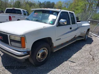 1991 GMC Sierra 1500 with VIN 2GTHC39N2M1512024, listed as a IAAI auction lot 42133143 with 216,701 mi miles and . Bid and sale history available at DreamBid. Image 2.