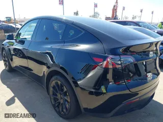 2023 Tesla Model Y Long Range with VIN 7SAYGDEE5PF972024, listed as a IAAI auction lot 41623512 with 22,202 mi miles. Bid and sale history available at carsss.com. Image 3.