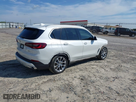 2023 BMW X5 xDrive40i with VIN 5UXCR6C09P9R25706, listed as a IAAI auction lot 42446957 with 34,004 mi miles and . Bid and sale history available at DreamBid. Image 4.