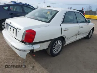 2005 Hyundai XG350 with VIN KMHFU45E95A413039, listed as a IAAI auction lot 41573746 with 167,306 mi miles. Bid and sale history available at carsss.com. Image 4.