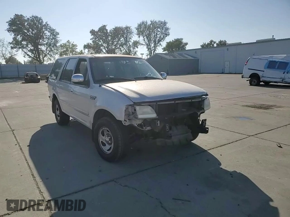 1997 Ford Expedition XLT z VIN 1FMEU1768VLA49281, wystawiony jako Copart lot #79895244 z przebiegiem 73 188 mil mil oraz Szkoda całkowita • Salvage title. Historia ofert i sprzedaży dostępna na DreamBid. Obrazek 11.