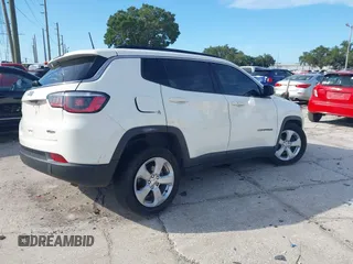 2019 Jeep Compass Altitude with VIN 3C4NJCBB3KT676807, listed as a IAAI auction lot 42595932 with 104,505 mi miles and . Bid and sale history available at DreamBid. Image 4.