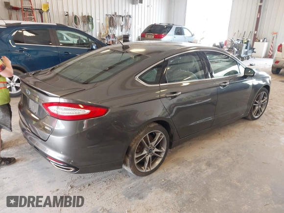 2016 Ford Fusion Titanium with VIN 3FA6P0D9XGR223354, listed as a IAAI auction lot 42621924 with Not provided miles and . Bid and sale history available at DreamBid. Image 4.