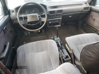 1987 Toyota Corolla с VIN JT2AE82E9H3531391, выставлен на аукционе Copart как лот 44657375 с пробегом 240 376 миль миль и Чистый • Clean title. История ставок и продаж доступна на DreamBid. Изображение 8.