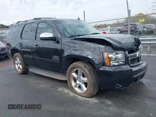 2011 Chevrolet Tahoe LS with VIN 1GNSCAE01BR392331, listed as a IAAI auction lot 41846108 with 171,015 mi miles and . Bid and sale history available at DreamBid. Image 1.