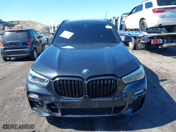 2019 BMW X5 xDrive50i with VIN 5UXJU2C5XKLN66873, listed as a IAAI auction lot 41472246 with 98,571 mi miles. Bid and sale history available at carsss.com. Image 11.