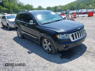 2011 Jeep Grand Cherokee Overland with VIN 1J4RR6GTXBC686740, listed as a IAAI auction lot 42412660 with 159,240 mi miles and . Bid and sale history available at DreamBid. Image 1.