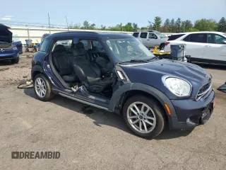 2015 MINI Countryman S z VIN WMWZC5C54FWP48739, wystawiony jako Copart lot #58197575 z przebiegiem 119 816 mil mil oraz Szkoda całkowita • Salvage title. Historia ofert i sprzedaży dostępna na DreamBid. Obrazek 4.