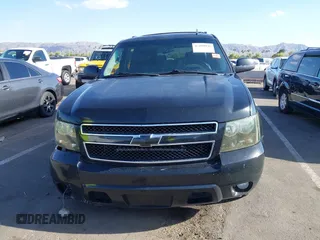 2012 Chevrolet Suburban LT with VIN 1GNSCJE00CR226285, listed as a IAAI auction lot 42059936 with 318,948 mi miles. Bid and sale history available at carsss.com. Image 12.