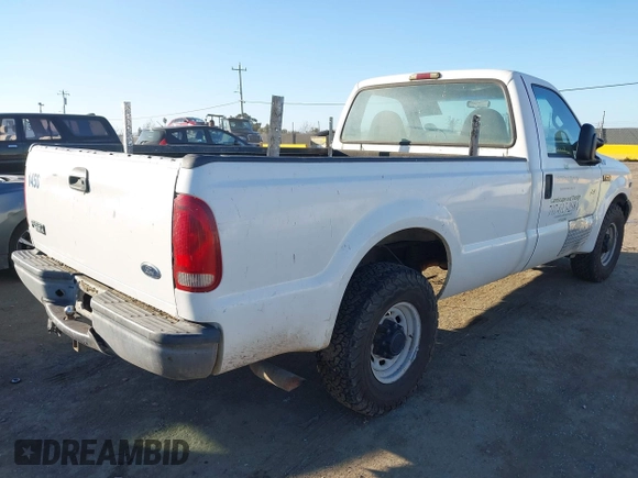 2002 Ford Super Duty F-250 XL with VIN 1FTNF20L72EB79640, listed as a IAAI auction lot 41667865 with 153,384 mi miles. Bid and sale history available at carsss.com. Image 4.