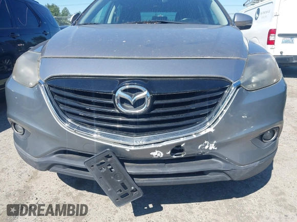 2014 Mazda CX-9 Grand Touring with VIN JM3TB2DA9E0435295, listed as a IAAI auction lot 42618683 with 177,783 mi miles and . Bid and sale history available at DreamBid. Image 6.