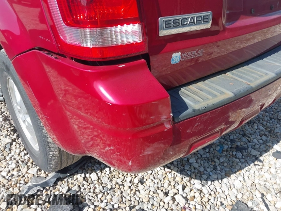 2009 Ford Escape XLS with VIN 1FMCU02759KC80412, listed as a IAAI auction lot 42228138 with 181,786 mi miles and . Bid and sale history available at DreamBid. Image 14.