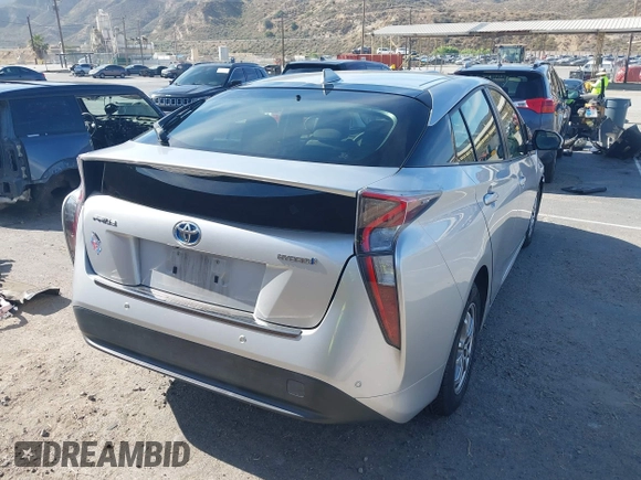 2017 Toyota Prius Two with VIN JTDKBRFU8H3048082, listed as a IAAI auction lot 42496637 with 104,302 mi miles and . Bid and sale history available at DreamBid. Image 4.
