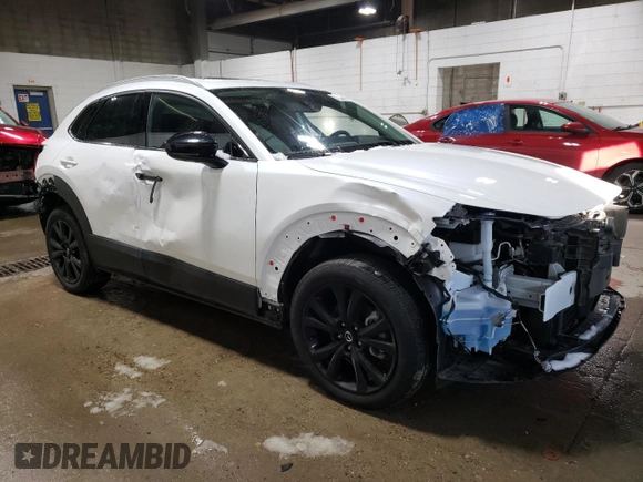 2023 Mazda CX-30 Premium Plus with VIN 3MVDMBEY3PM587798, listed as a Copart auction lot 86524444 with 9,860 mi miles and Salvage title. Bid and sale history available at DreamBid. Image 4.