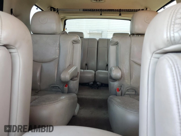 2004 Cadillac Escalade z VIN 1GYEK63N24R251463, wystawiony jako Copart lot #59404565 z przebiegiem 215 203 mil mil oraz Czysty tytuł • Clean title. Historia ofert i sprzedaży dostępna na DreamBid. Obrazek 10.