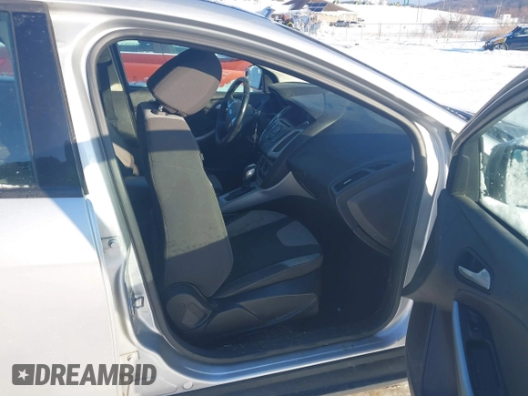 2012 Ford Focus SE with VIN 1FAHP3F27CL457213, listed as a IAAI auction lot 41303904 with 215,044 mi miles and . Bid and sale history available at DreamBid. Image 5.