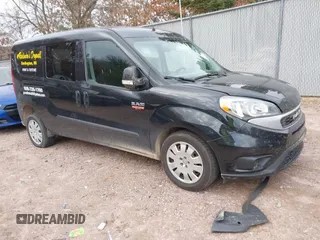 2020 Ram ProMaster City Wagon SLT with VIN ZFBHRFBB0L6S21239, listed as a IAAI auction lot 40900831 with 73,973 mi miles. Bid and sale history available at carsss.com. Image 1.