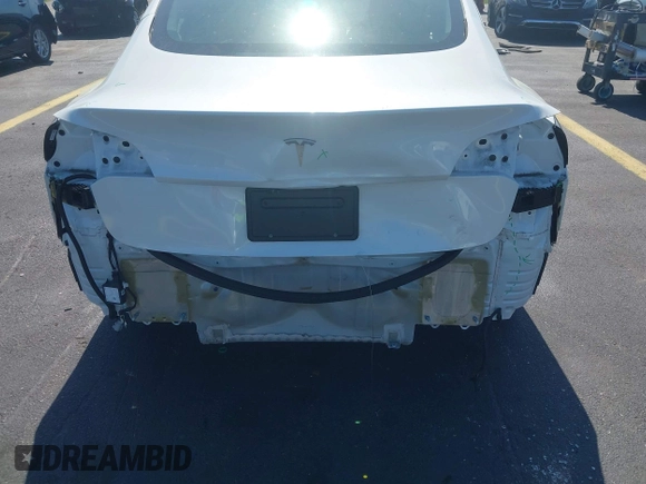 2023 Tesla Model 3 with VIN 5YJ3E1EA0PF548498, listed as a IAAI auction lot 42334326 with 17,674 mi miles and . Bid and sale history available at DreamBid. Image 6.