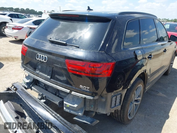 2018 Audi Q7 Prestige with VIN WA1VAAF77JD031456, listed as a IAAI auction lot 42593433 with 141,200 mi miles and . Bid and sale history available at DreamBid. Image 4.