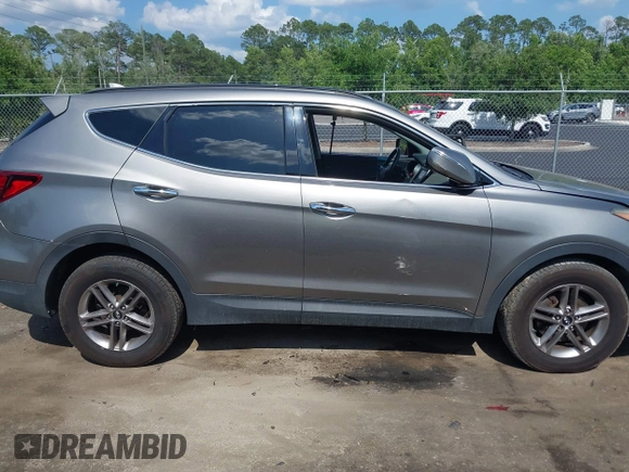 2017 Hyundai Santa Fe 2.4L z VIN 5NMZU3LB7HH025791, wystawiony jako IAAI lot #42277964 z przebiegiem 154 110 mil mil oraz . Historia ofert i sprzedaży dostępna na DreamBid. Obrazek 13.