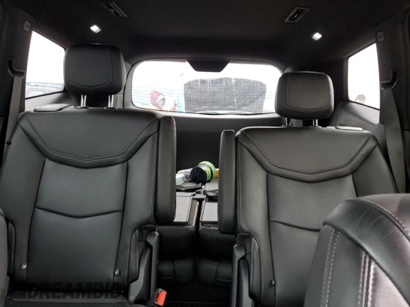 2021 Cadillac XT6 Premium Luxury z VIN 1GYKPDRS8MZ103159, wystawiony jako Copart lot #73400792 z przebiegiem 54 365 mil mil oraz . Historia ofert i sprzedaży dostępna na DreamBid. Obrazek 10.