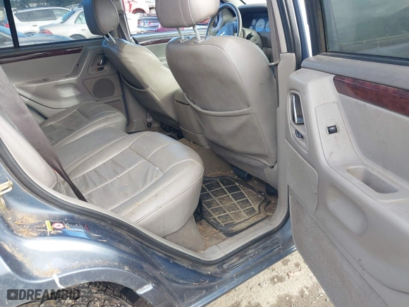 2003 Jeep Grand Cherokee Limited with VIN 1J8GW58S93C589285, listed as a IAAI auction lot 41467743 with 231,614 mi miles. Bid and sale history available at carsss.com. Image 8.