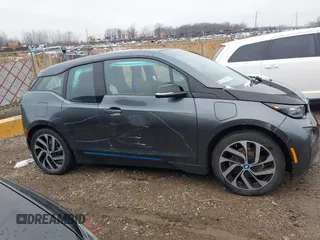 2017 BMW i3 z VIN WBY1Z8C38HV892591, wystawiony jako IAAI lot #42009374 z przebiegiem 41 091 mil mil oraz . Historia ofert i sprzedaży dostępna na DreamBid. Obrazek 13.