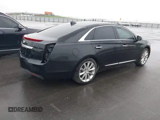 2016 Cadillac XTS Livery Package with VIN 2G61U5S38G9136327, listed as a IAAI auction lot 41935174 with 136,672 mi miles. Bid and sale history available at carsss.com. Image 4.