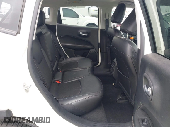 2021 Jeep Compass Latitude with VIN 3C4NJCBB6MT538682, listed as a IAAI auction lot 42442459 with 59,163 mi miles and . Bid and sale history available at DreamBid. Image 8.