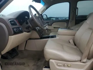 2013 Chevrolet Suburban LT with VIN 1GNSKJE78DR330458, listed as a Copart auction lot 56143205 with 202,809 mi miles and Clean Title. Bid and sale history available at DreamBid. Image 7.