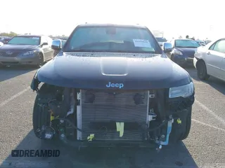 2014 Jeep Grand Cherokee Overland with VIN 1C4RJFCT5EC221015, listed as a IAAI auction lot 41959844 with 78,367 mi miles and . Bid and sale history available at DreamBid. Image 13.