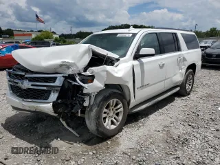 2015 Chevrolet Suburban LT with VIN 1GNSCJKC3FR501425, listed as a Copart auction lot 58560275 with 183,058 mi miles and Salvage title. Bid and sale history available at DreamBid. Image 1.
