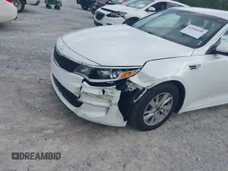 2017 Kia Optima LX z VIN 5XXGT4L32HG161091, wystawiony jako IAAI lot #42266149 z przebiegiem 166 254 mil mil oraz . Historia ofert i sprzedaży dostępna na DreamBid. Obrazek 6.