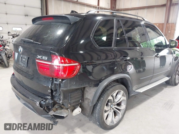 2012 BMW X5 50i with VIN 5UXZV8C50CL425721, listed as a IAAI auction lot 42590676 with 192,355 mi miles and . Bid and sale history available at DreamBid. Image 6.