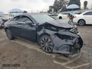 2021 Mercedes-Benz CLA with VIN W1K5J4GBXMN151685, listed as a Copart auction lot 48045045 with 77,257 mi miles and Salvage Title. Bid and sale history available at carsss.com. Image 4.